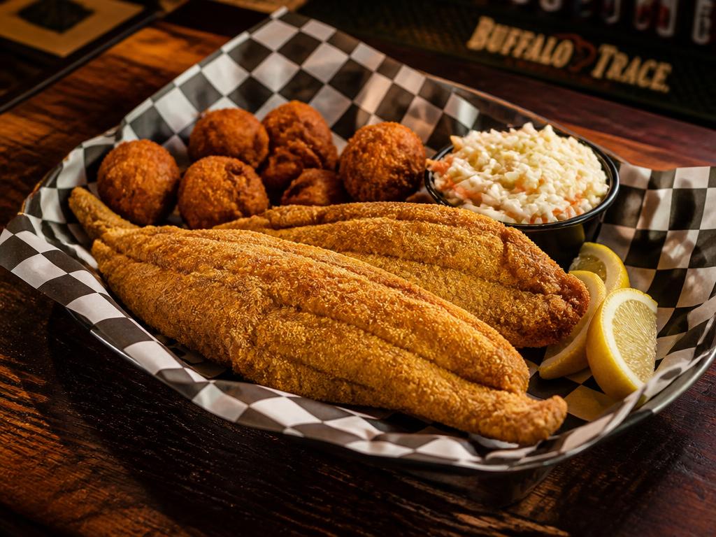 Fried catfish basket with hush puppies and slaw